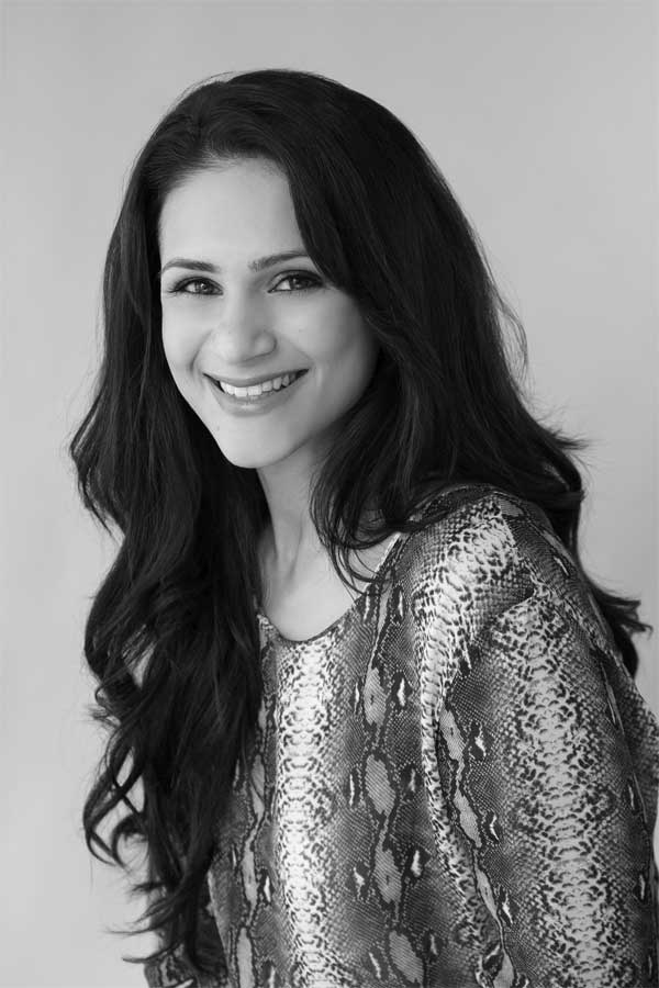 Black and white portrait of Esha Oberoi