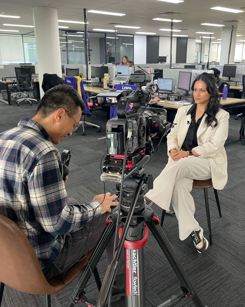 Esha being interviewed at the Leora Healthcare office