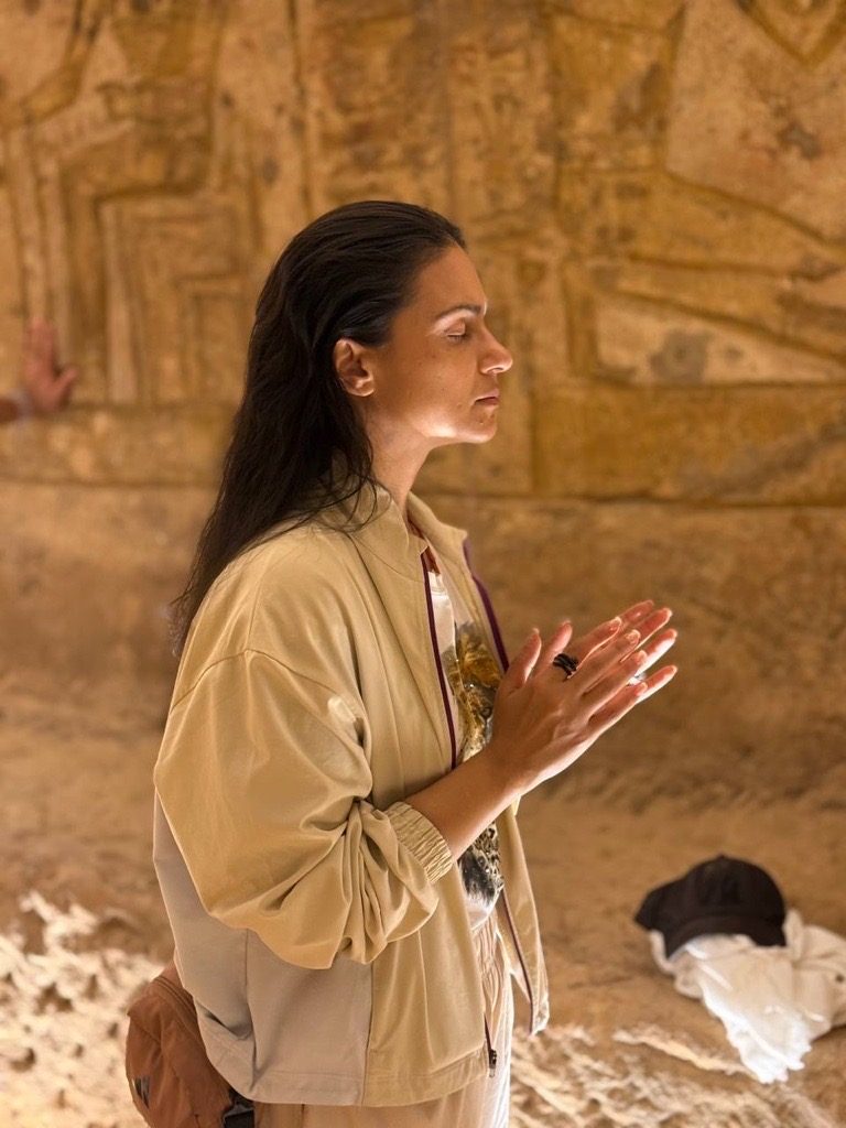 Esha in prayer at a temple